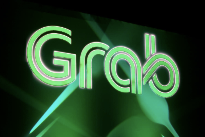 Grab membantah merger