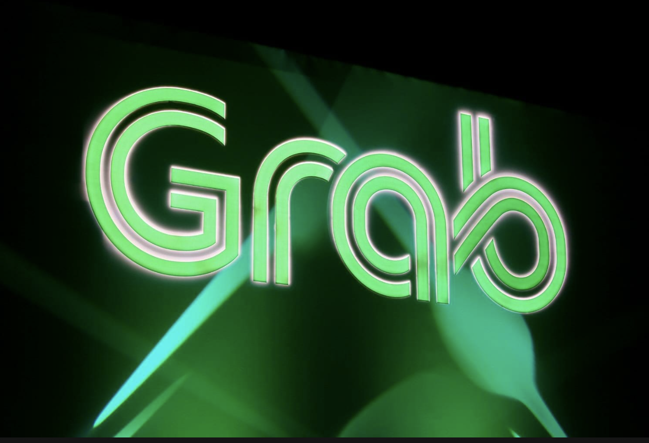 Grab membantah merger