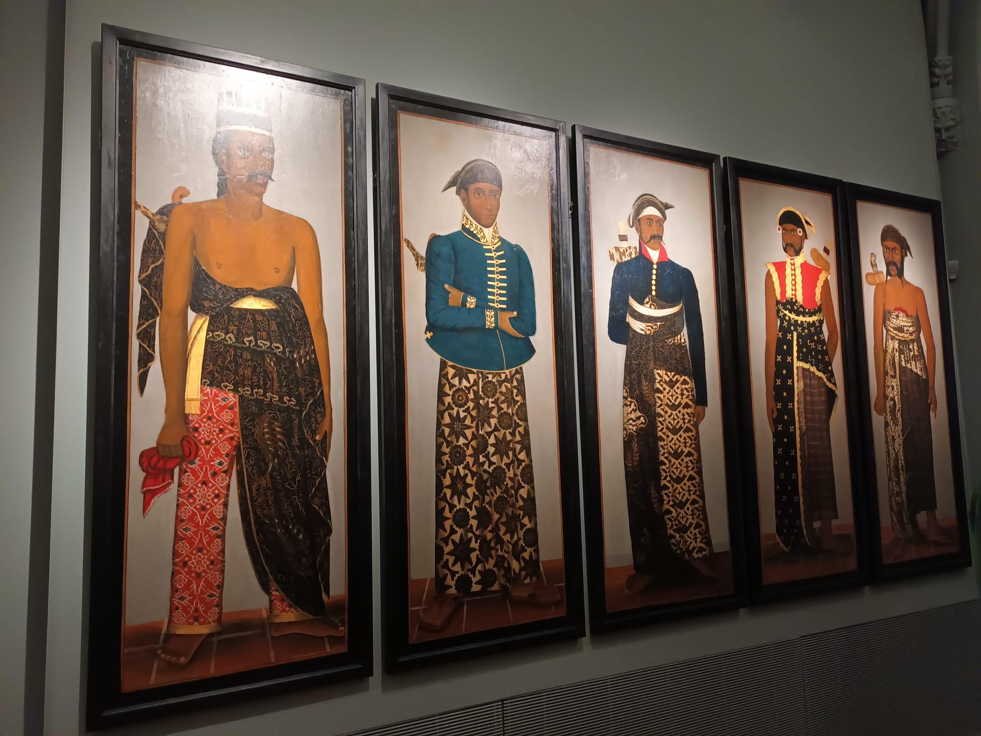 A series of historical portraits highlights clothing, textiles, and personal presentation
