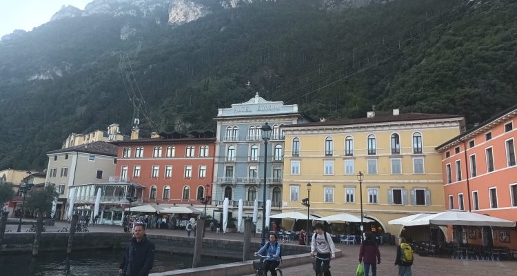 Hotel Europa and its neighbours, with the mountain wall looming directly behind the harbour front