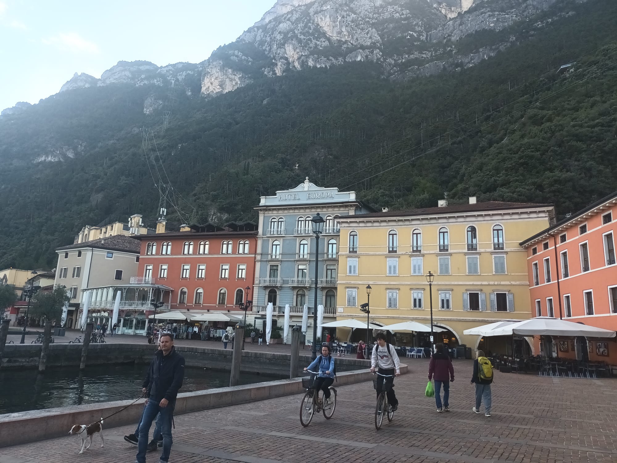 Hotel Europa and its neighbours, with the mountain wall looming directly behind the harbour front